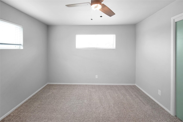 221 S 7th St, Jacksboro, TX 76458 - spare room featuring ceiling fan, carpet floors, and baseboards