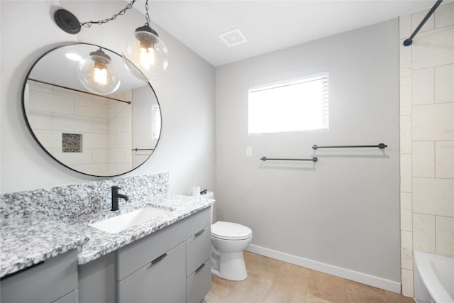 221 S 7th St, Jacksboro, TX 76458 - full bath featuring vanity, toilet, baseboards, shower / washtub combination, and tile patterned flooring