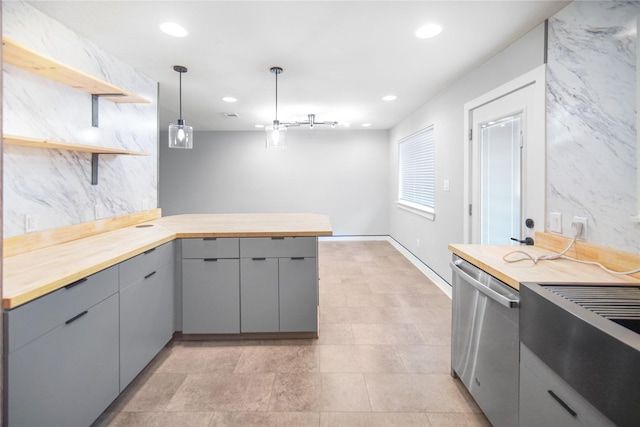 221 S 7th St, Jacksboro, TX 76458 - kitchen with open shelves, butcher block counters, a peninsula, gray cabinetry, and recessed lighting