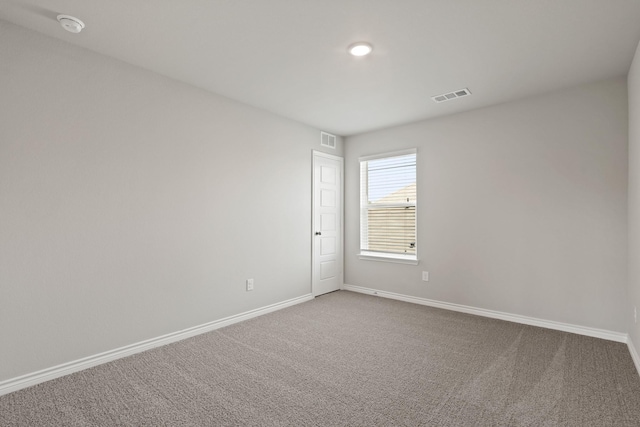 10605 Stag Ln, Fort Worth, TX 76036 - carpeted spare room featuring baseboards and a smoke detector