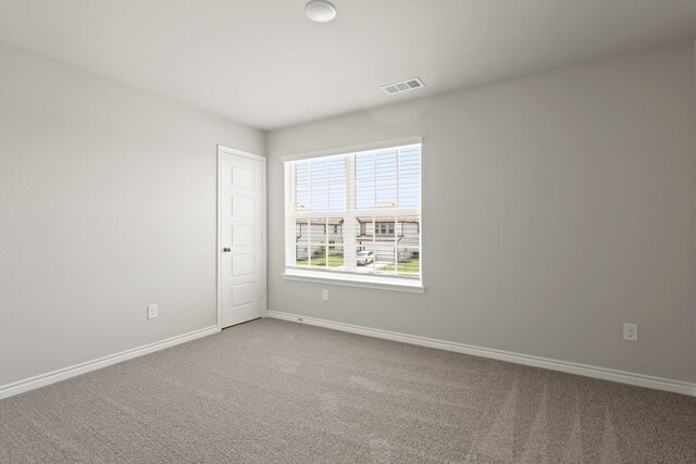10605 Stag Ln, Fort Worth, TX 76036 - carpeted spare room featuring baseboards