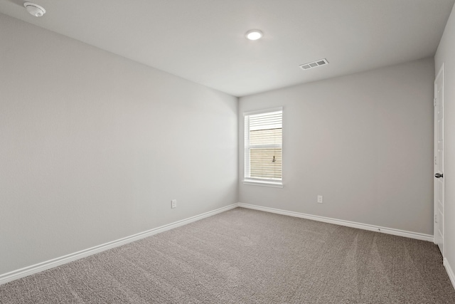10605 Stag Ln, Fort Worth, TX 76036 - carpeted empty room featuring baseboards and a smoke detector