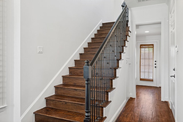 1120 Hemingway Ln, Irving, TX 75063 - stairway with wood finished floors, baseboards, and recessed lighting