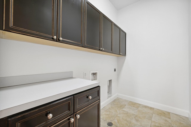 1120 Hemingway Ln, Irving, TX 75063 - laundry room featuring hookup for an electric dryer, cabinet space, baseboards, and washer hookup