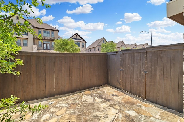 1120 Hemingway Ln, Irving, TX 75063 - view of yard with a residential view and a gate