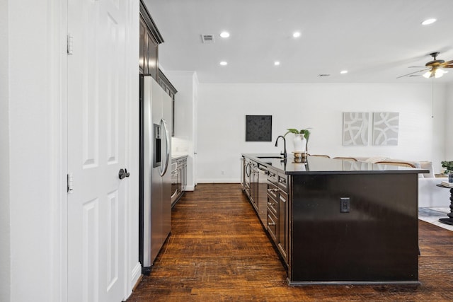 1120 Hemingway Ln, Irving, TX 75063 - kitchen featuring stainless steel fridge with ice dispenser, ceiling fan, a sink, recessed lighting, and a center island with sink