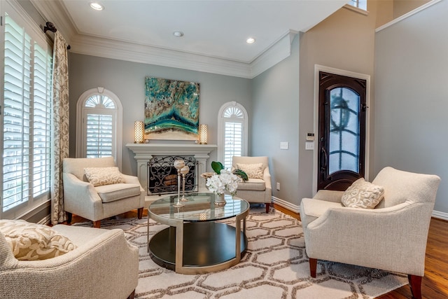 9352 Stratford Way, Dallas, TX 75220 - living area featuring wood finished floors, a fireplace, crown molding, baseboards, and recessed lighting