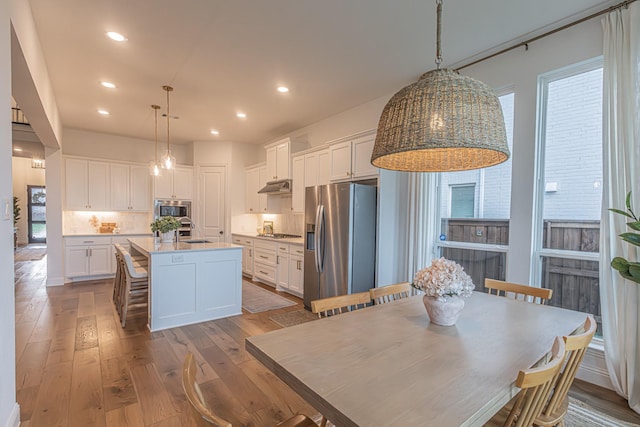 1050 Adair Rd, Prosper, TX 75078 - dining area featuring hardwood / wood-style floors and recessed lighting