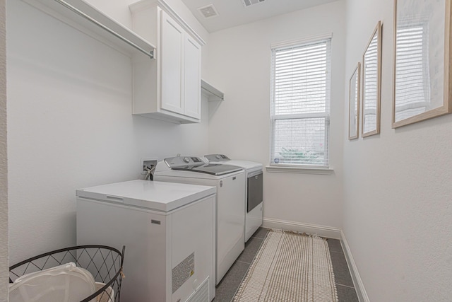 1050 Adair Rd, Prosper, TX 75078 - laundry area with washing machine and clothes dryer, cabinet space, plenty of natural light, and baseboards