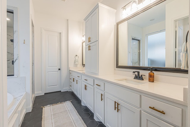 1050 Adair Rd, Prosper, TX 75078 - bathroom with double vanity, a marble finish shower, a garden tub, and tile patterned floors