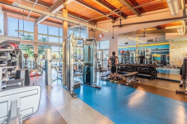 1050 Adair Rd, Prosper, TX 75078 - workout area featuring a towering ceiling, healthy amount of natural light, and wood ceiling with exposed beams