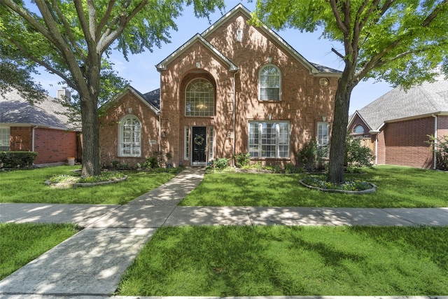 3509 Walington Dr, Plano, TX 75093 - traditional home featuring brick siding and a front yard