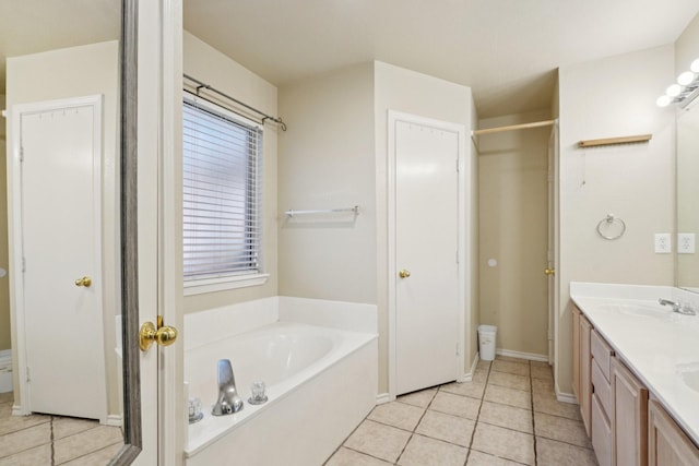 110 Apache Trl, Alvarado, TX 76009 - full bathroom with a garden tub, double vanity, tile patterned floors, and baseboards