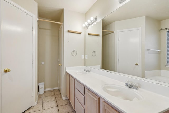 110 Apache Trl, Alvarado, TX 76009 - full bath with double vanity, tile patterned flooring, a shower, and baseboards