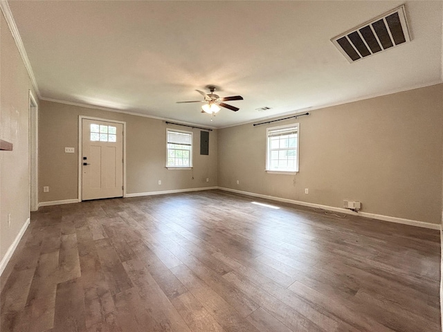 125 Park St E, Sulphur Springs, TX 75482 - empty room featuring crown molding, a ceiling fan, dark wood-type flooring, and baseboards