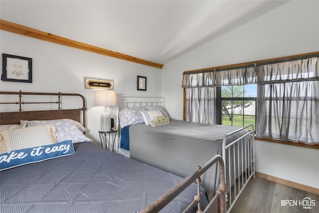 367 Penobscot Trl, Henrietta, TX 76365 - bedroom featuring vaulted ceiling, wood finished floors, and baseboards