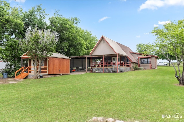 367 Penobscot Trl, Henrietta, TX 76365 - rear view of property featuring a yard and an outbuilding