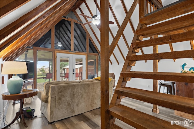 367 Penobscot Trl, Henrietta, TX 76365 - living area featuring french doors, stairway, vaulted ceiling, and wood finished floors
