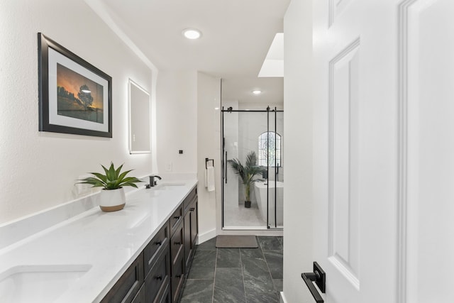 6607 Canalview Dr, Arlington, TX 76016 - bathroom with double vanity, a shower stall, marble finish flooring, a freestanding tub, and recessed lighting