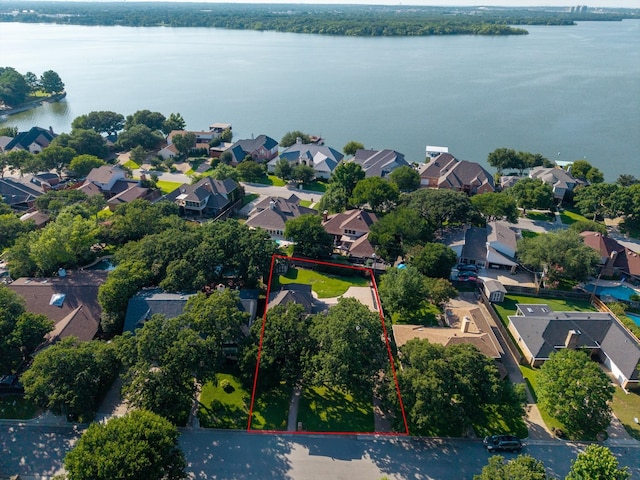 6607 Canalview Dr, Arlington, TX 76016 - aerial perspective of suburban area with a nearby body of water and property boundaries highlighted