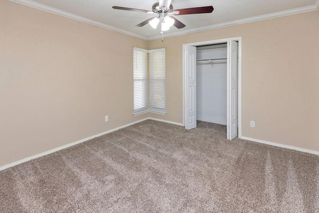 1425 Bryan Dr, Bedford, TX 76022 - unfurnished bedroom with carpet floors, crown molding, baseboards, ceiling fan, and a closet