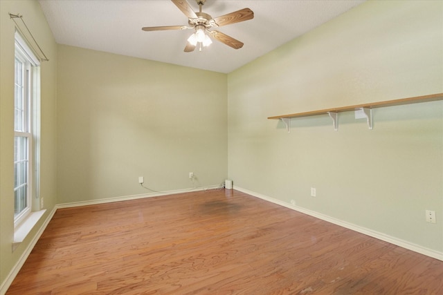 1302 Woodmont Dr, Allen, TX 75002 - spare room with light wood-style flooring, baseboards, and a ceiling fan