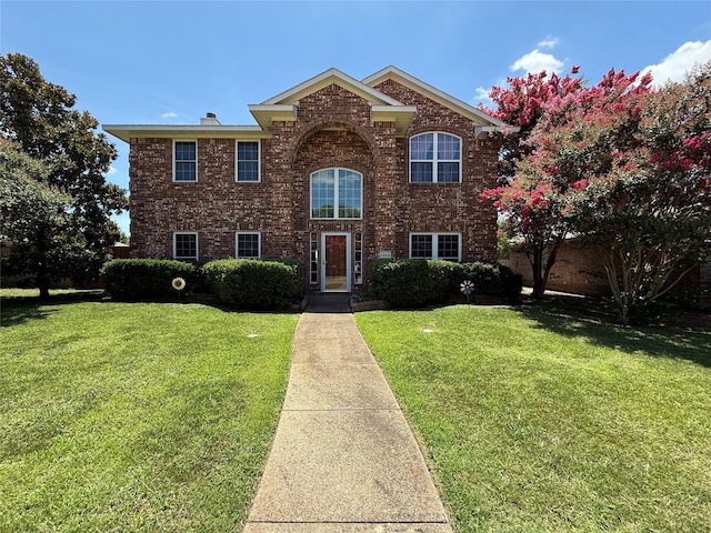1302 Woodmont Dr, Allen, TX 75002 - traditional-style home with brick siding and a front lawn