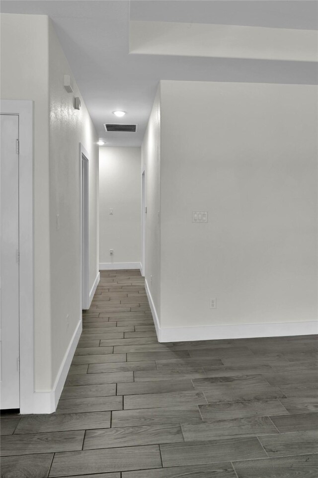 5506 Cold Water Trl, Granbury, TX 76048 - corridor with baseboards and wood finished floors