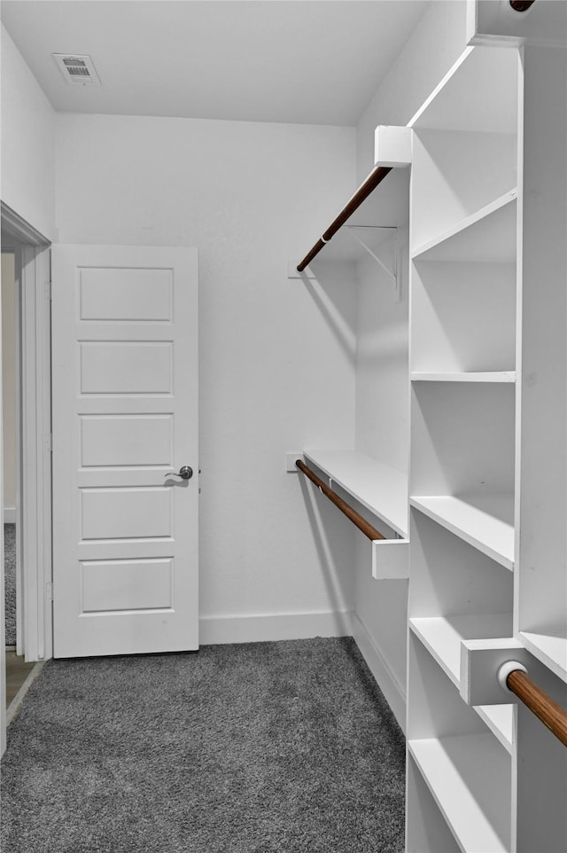 5506 Cold Water Trl, Granbury, TX 76048 - spacious closet featuring dark colored carpet