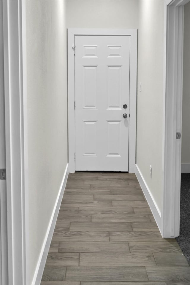 5506 Cold Water Trl, Granbury, TX 76048 - entryway with baseboards and wood finished floors