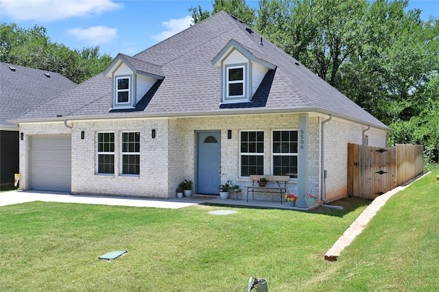 5506 Cold Water Trl, Granbury, TX 76048 - view of front of house with brick siding, a shingled roof, a garage, and concrete driveway