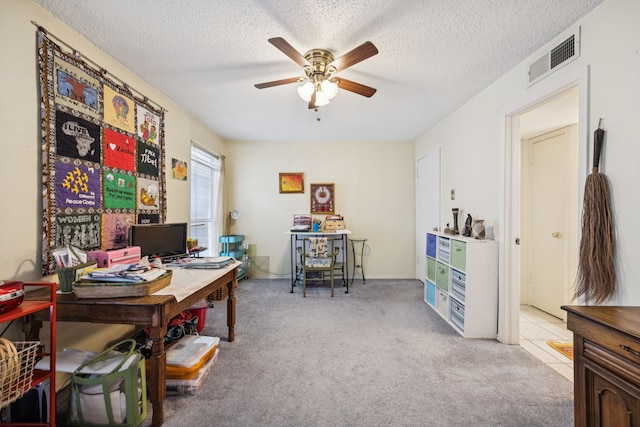 9222 Church Rd Unit 108, Dallas, TX 75231 - home office featuring a ceiling fan, carpet, and a textured ceiling