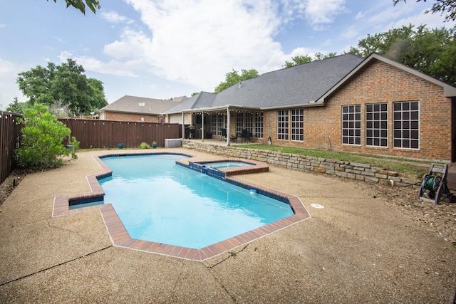 611 Christan Ct, Rockwall, TX 75087 - view of pool with a fenced backyard, a patio, and a pool with connected hot tub