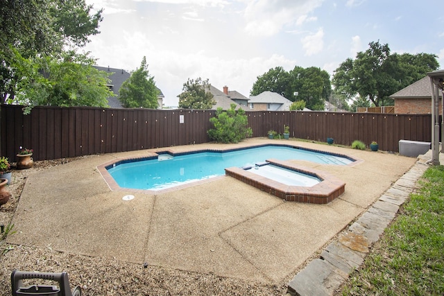 611 Christan Ct, Rockwall, TX 75087 - view of swimming pool with a patio area, a fenced backyard, and a pool with connected hot tub