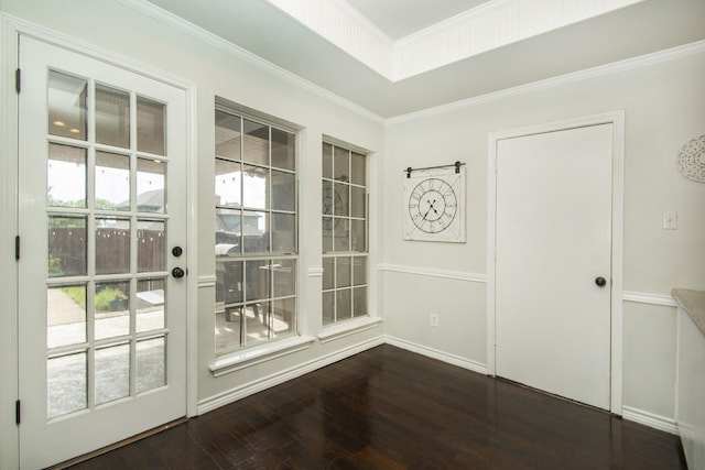 611 Christan Ct, Rockwall, TX 75087 - doorway with wood finished floors, crown molding, and baseboards