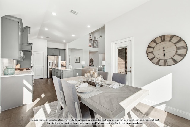 1025 Raptor Rd, Alvarado, TX 76009 - dining area with dark wood-style floors, lofted ceiling, recessed lighting, and baseboards