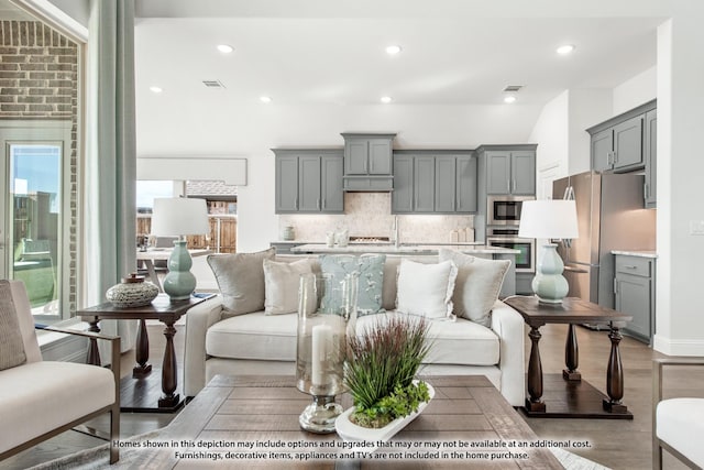 1025 Raptor Rd, Alvarado, TX 76009 - living room featuring light wood-type flooring and recessed lighting