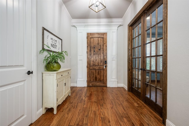 9410 Tay Ln, Justin, TX 76247 - entryway featuring french doors, dark wood-style floors, baseboards, and crown molding