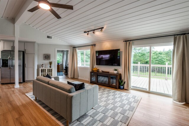 1410 Traildust Dr, Lowry Crossing, TX 75069 - living room featuring light wood finished floors, ceiling fan, and rail lighting