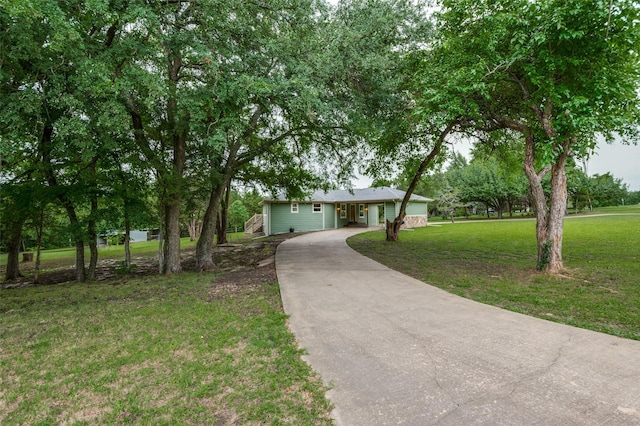 1410 Traildust Dr, Lowry Crossing, TX 75069 - single story home featuring driveway and a front lawn