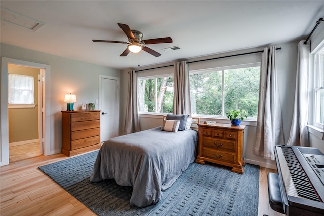 1410 Traildust Dr, Lowry Crossing, TX 75069 - bedroom with wood finished floors, a ceiling fan, attic access, and baseboards