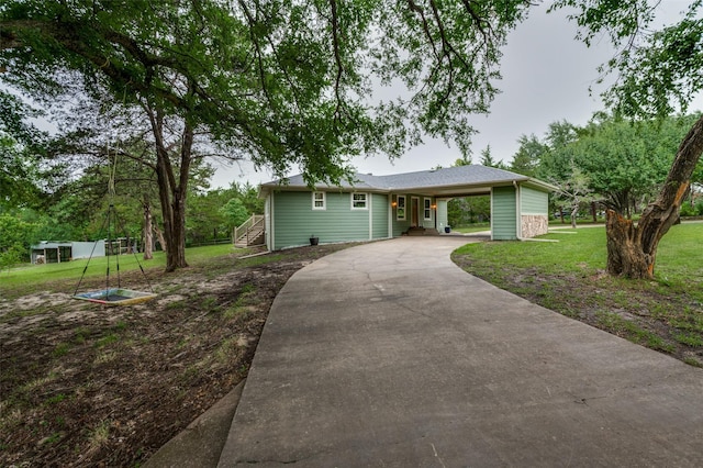 1410 Traildust Dr, Lowry Crossing, TX 75069 - single story home with driveway, a front lawn, and an attached carport