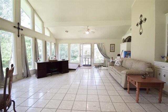 738 Westwood Dr, Marlin, TX 76661 - living room with light tile patterned floors, healthy amount of natural light, a ceiling fan, beam ceiling, and high vaulted ceiling