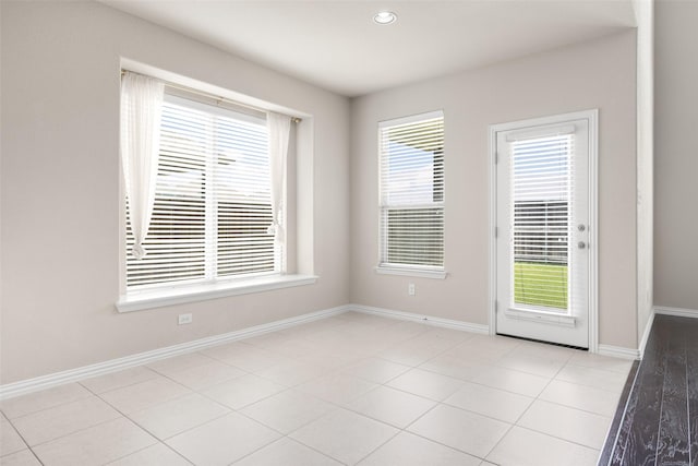 4104 Portola Dr, Mckinney, TX 75070 - unfurnished dining area with recessed lighting and light tile patterned floors