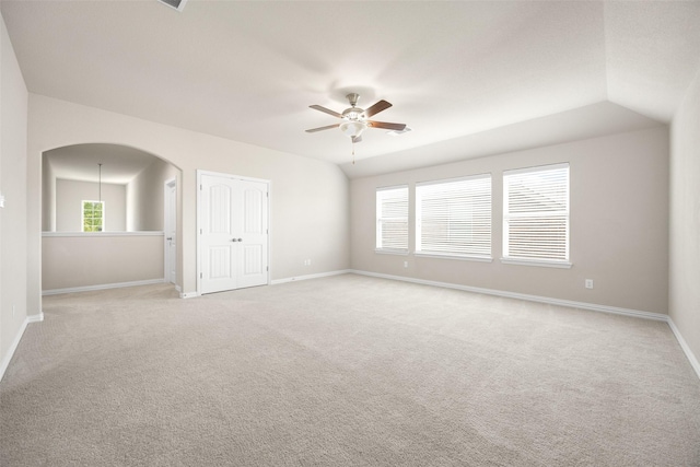 4104 Portola Dr, Mckinney, TX 75070 - spare room with a ceiling fan, light carpet, and arched walkways