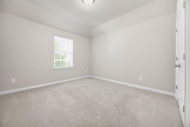 4104 Portola Dr, Mckinney, TX 75070 - spare room featuring carpet flooring and vaulted ceiling