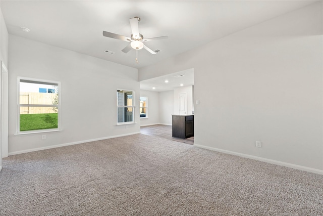 6310 Racer Summit Dr, Dallas, TX 75241 - unfurnished living room with light colored carpet, a ceiling fan, baseboards, and recessed lighting