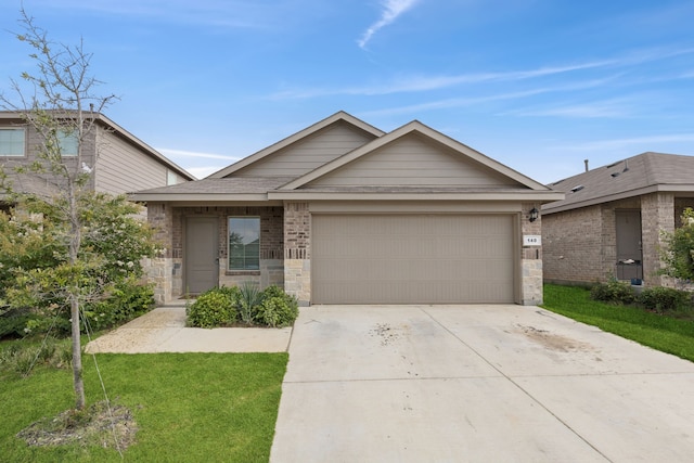 140 Running River Dr, Boyd, TX 76023 - view of front of house featuring a garage, driveway, a front yard, brick siding, and stone siding