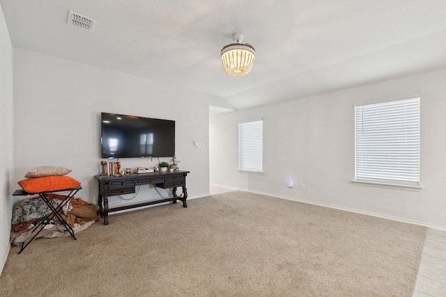 140 Running River Dr, Boyd, TX 76023 - living area featuring a chandelier, carpet flooring, and baseboards