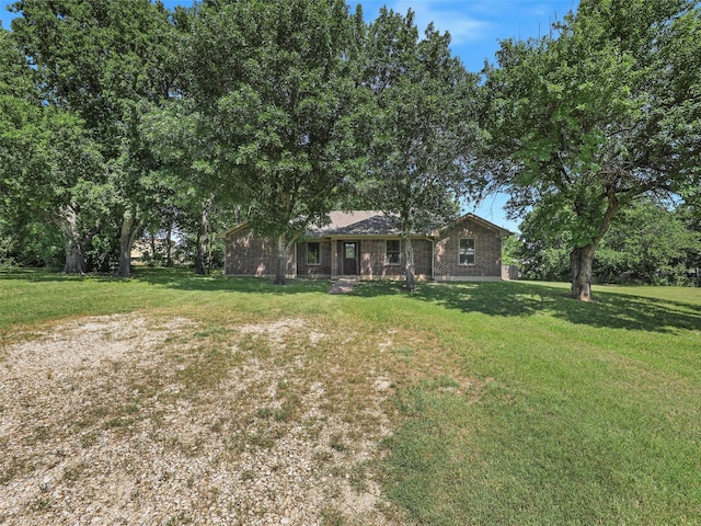 7275 Fm 455 W, Sanger, TX 76266 - view of front of property with a front lawn and brick siding